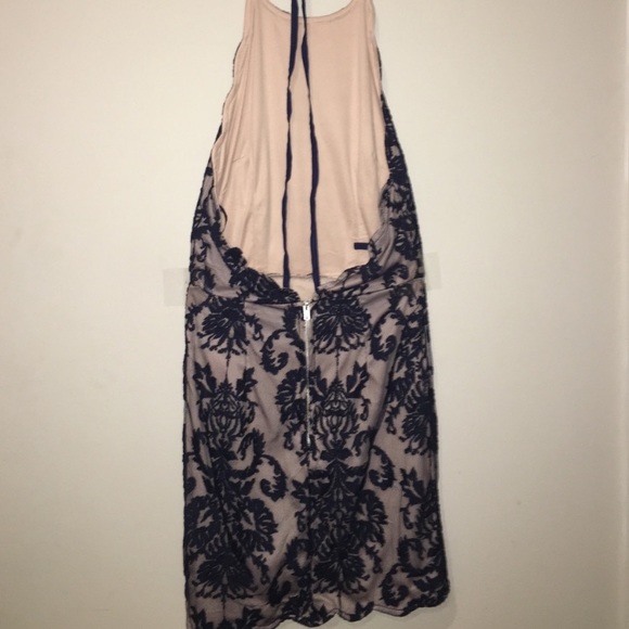 Halter Mini with Low Cut back. Never worn w/ Tags - Picture 2 of 3